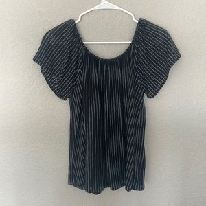 Off-the-shoulder blouse.